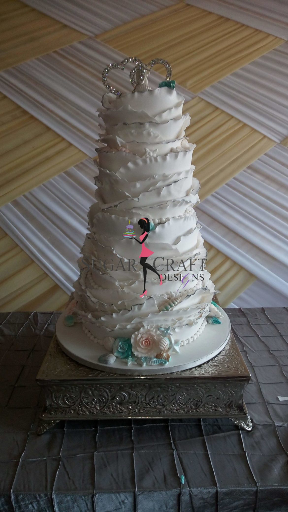 White-ruffle-wedding-cake-scaled.jpg